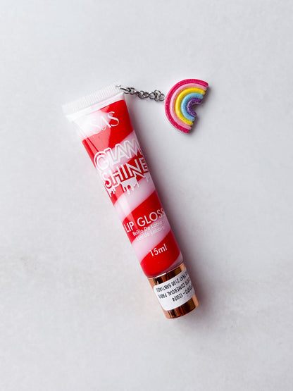 SAS - PACK DE 6: Gloss GLAM SHINE aroma Chocolate con charm ($1.665 c/u)